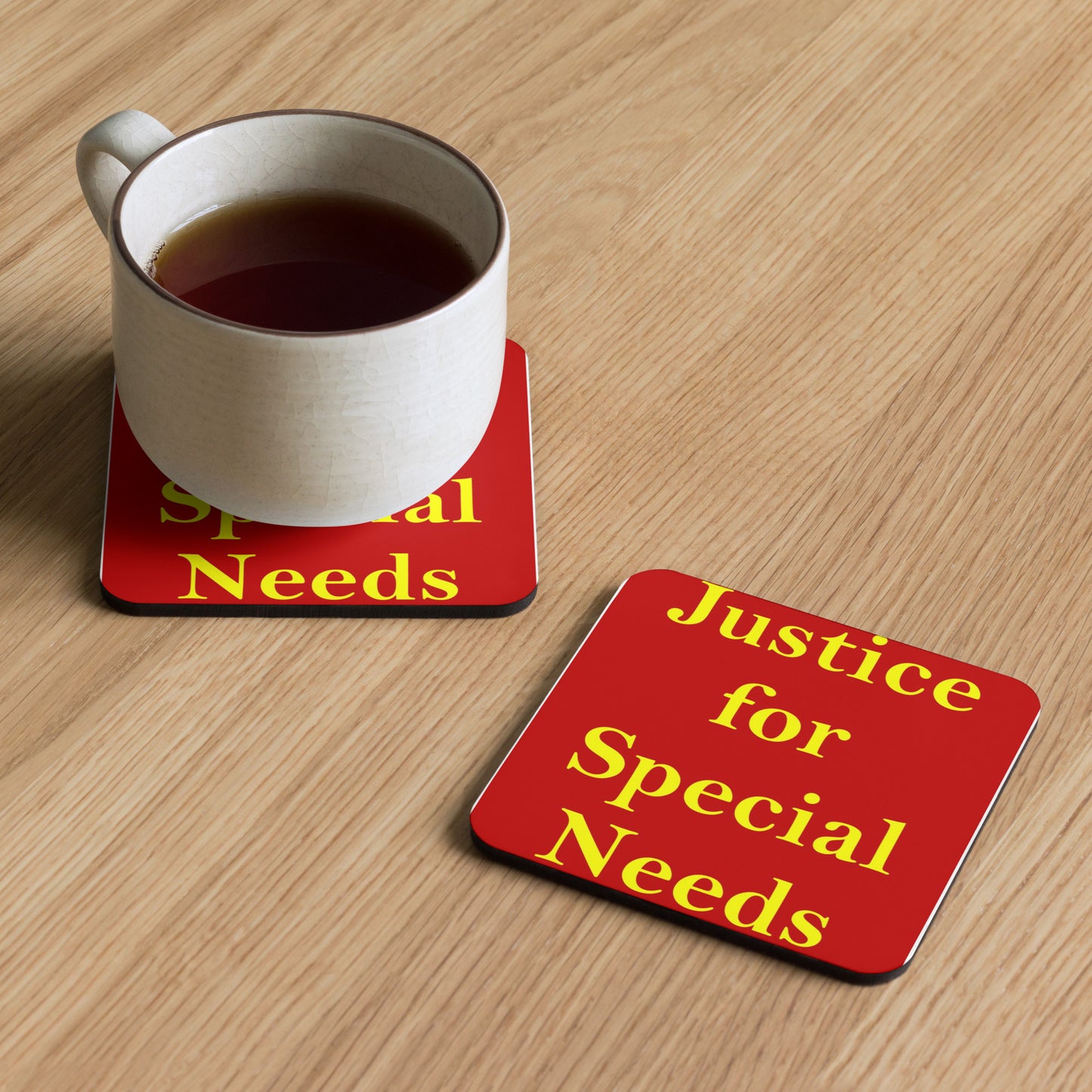 JUSTICE FOR SPECIAL NEEDS = Cork-back coaster